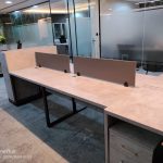 Office workstation in a dubai office with grey color partition and top.